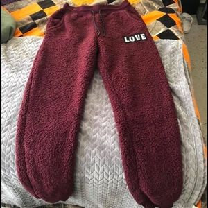 Burgundy size small jogging pants short legs.